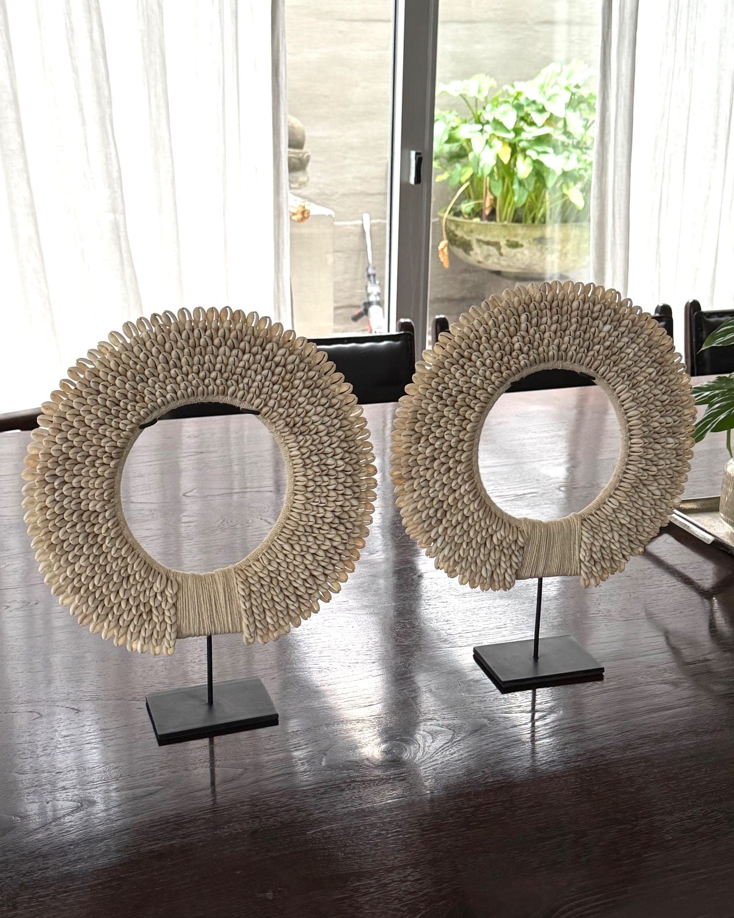 Par de aros decorativos con caracoles