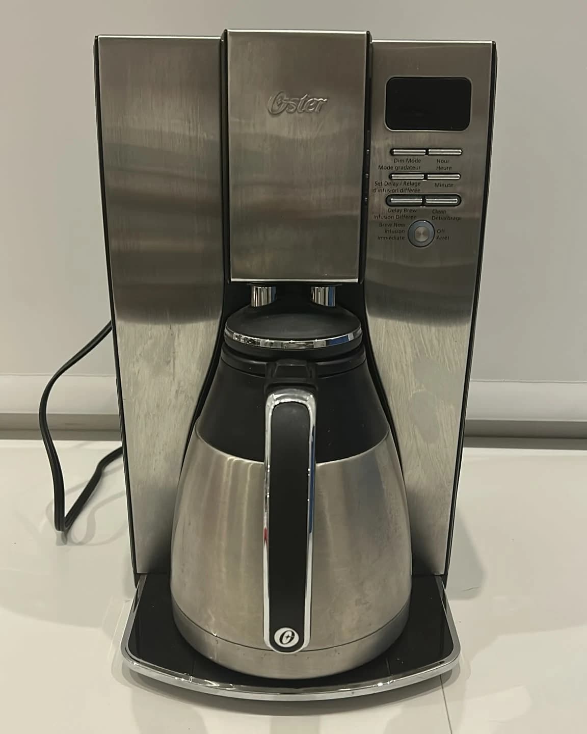 Cafetera Oster acero inoxidable con jarra térmica