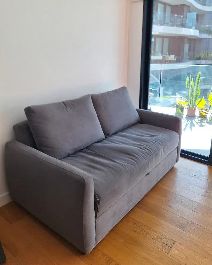 Sillón cama dos cuerpos gris